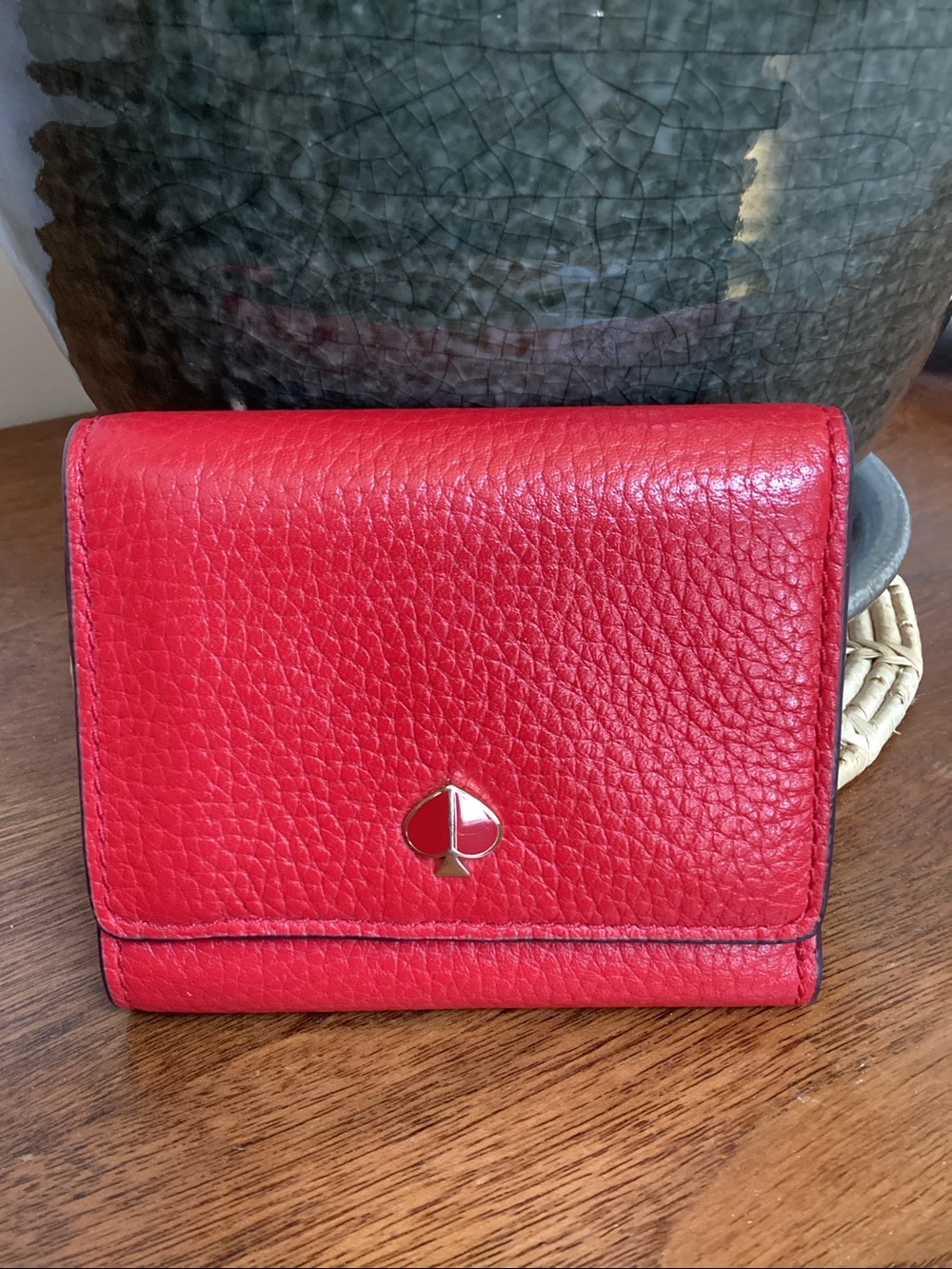 Kate Spade red pebbled leather Kayla small zip wallet with spade logo